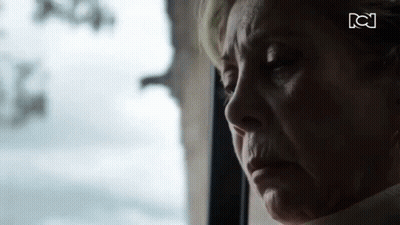 Elderly Woman Looking Out Window Eyes Closed GIF