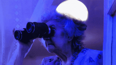 Elderly Woman Looking Through Binoculars GIF