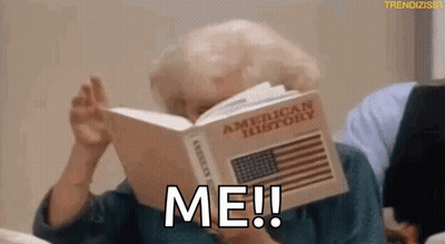 Elderly Woman Reading American History Book Covering Face GIF