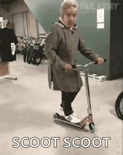 Elderly Woman Riding Scooter GIF