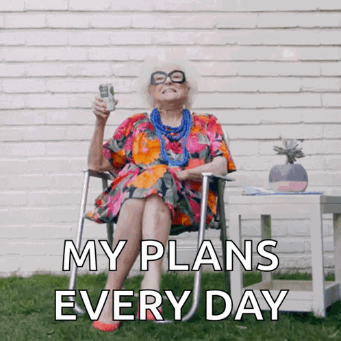 Elderly Woman Sitting Holding Soda GIF