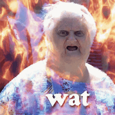 Elderly Woman Surrounded By Flames With Wat Shirt GIF