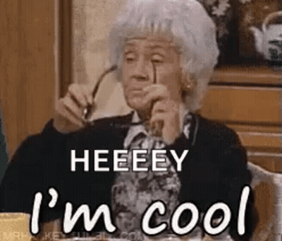 Elderly Woman With Glasses Saying Heeeey I'm Cool GIF