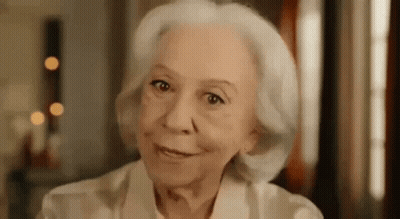 Elderly Woman With White Hair Smiling At Camera GIF