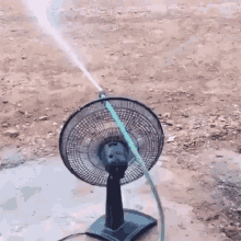 Electric Fan With Water Hose Gif
