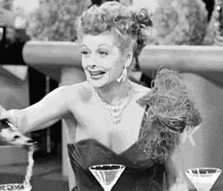 Elegant Lucille Ball Champagne Popping GIF
