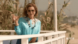 Elegant Lucille Bluth Holding Wine Glass  GIF