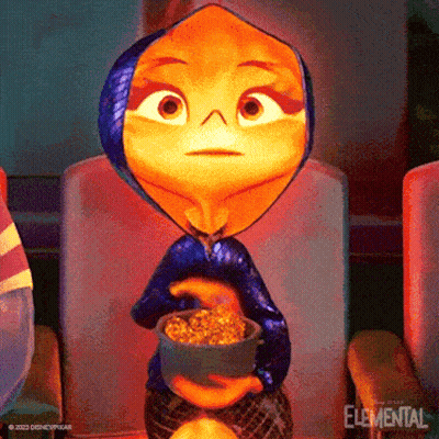 Elemental Character Holding Popcorn GIF