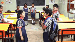 Elementary Boy Gives Girl Water To Drink GIF
