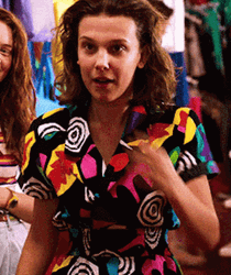 Eleven Fixing Hair Looking Gorgeous GIF