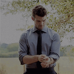 Elijah Mikaelson Vampire Diaries Dressing Up GIF