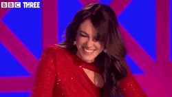 Elizabeth Hurley Laughing Alone GIF