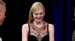 Elle Fanning Reading Questions Tonight GIF