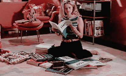 Elle Woods Searching Through Magazine GIF