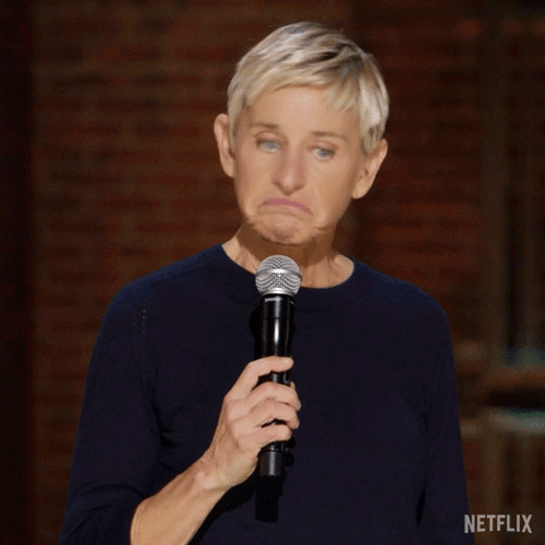 Ellen Degeneres Holding A Microphone And Saying I 'M Out GIF