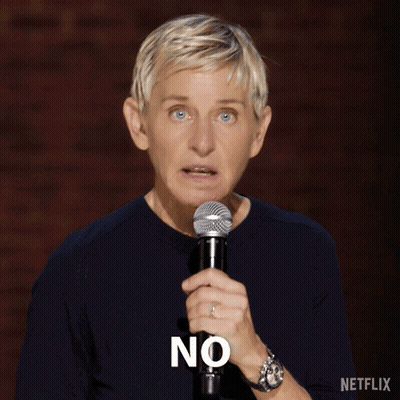 Ellen Degeneres Is Holding A Microphone With The Word No On It GIF