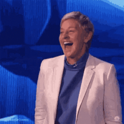 Ellen Degeneres Is Laughing While Wearing A White Jacket GIF