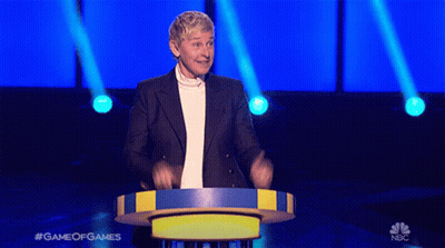 Ellen Degeneres Is Standing At A Podium On A Game Of Games Show GIF