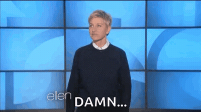 Ellen Degeneres Making Face Against Blue Wall GIF