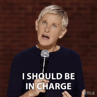Ellen Degeneres Says I Should Be In Charge While Holding A Microphone GIF