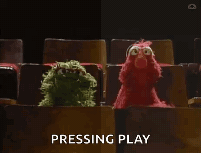 Elmo And Scarecrow Watching Play In Theater GIF