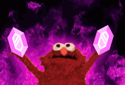 Elmo From Sesame Street Is Holding Two Pink Blocks In His Hands GIF