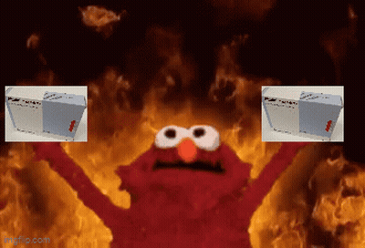 Elmo From Sesame Street Is Holding Up Two Boxes In Front Of A Fire Background GIF
