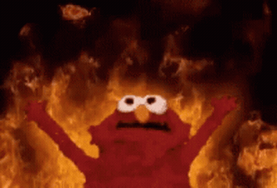 Elmo From Sesame Street Is On Fire With His Arms Outstretched GIF
