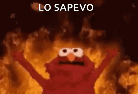 Elmo From Sesame Street Is On Fire With His Arms Outstretched . GIF