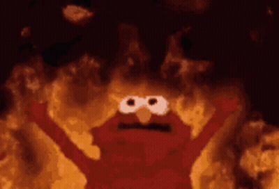 Elmo From Sesame Street Is On Fire With His Arms Outstretched And His Eyes Closed . GIF