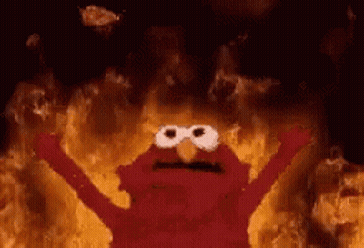 Elmo From Sesame Street Is On Fire With His Arms Outstretched And His Eyes Closed . GIF