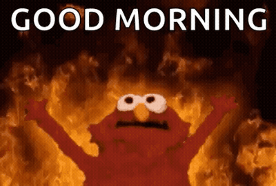 Elmo From Sesame Street Is On Fire With His Arms Outstretched And Says `` Good Morning '' . GIF