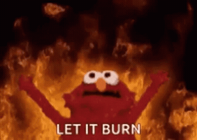 Elmo From Sesame Street Is On Fire With His Arms Outstretched And The Words `` Let It Burn '' . GIF