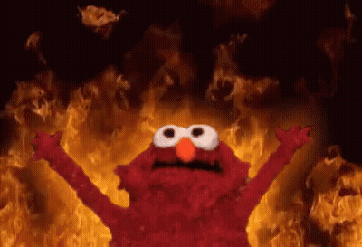 Elmo From Sesame Street Is On Fire With His Arms Outstretched GIF