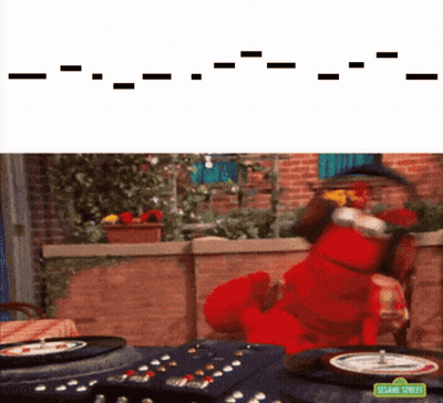 Elmo From Sesame Street Is Playing A Game With A Roulette Wheel GIF