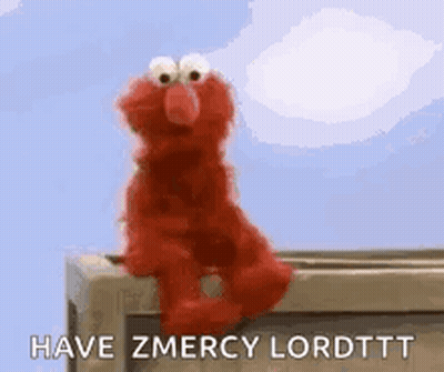 Elmo From Sesame Street Is Sitting On A Railing And Asking For Mercy . GIF