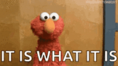 Elmo From Sesame Street Is Standing In Front Of A Wall And Says `` It Is What It Is '' . GIF