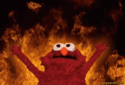 Elmo From Sesame Street Is Surrounded By Fire GIF