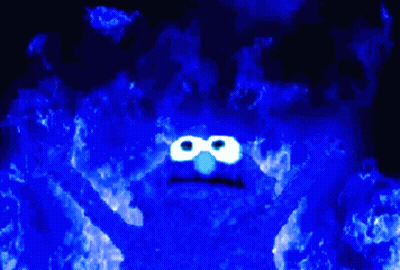 Elmo From Sesame Street Is Surrounded By Flames GIF