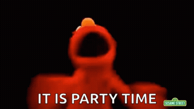 Elmo From Sesame Street Says It Is Party Time In A Dark Room . GIF