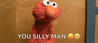 Elmo From Sesame Street Says " You Silly Man " In Front Of A Brown Wall GIF