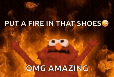 Elmo From Sesame Street Standing In Front Of Fire GIF