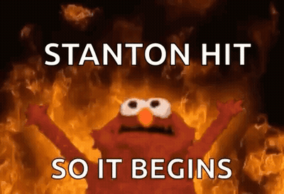 Elmo From Sesame Street Standing In Front Of Fire Saying Stanton Hit So It Begins GIF