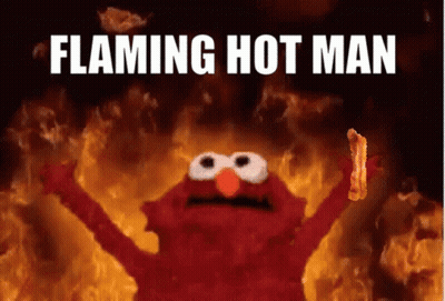 Elmo Holding Bacon In Front Of Flames Flaming Hot Man GIF