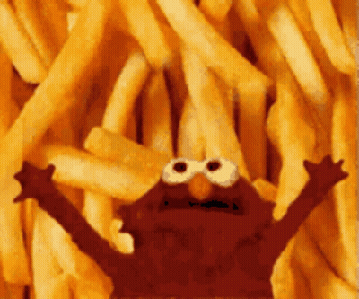 Elmo In Front Of French Fries GIF