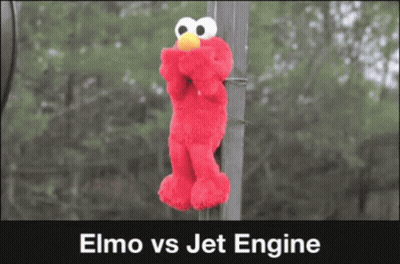 Elmo Is Hanging From A Pole With The Words Elmo Vs Jet Engine Below It GIF