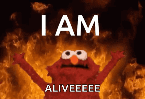 Elmo Is On Fire With The Words I Am Aliveee GIF