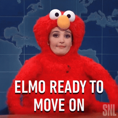 Elmo Is Ready To Move On And Is Wearing A Red Costume GIF