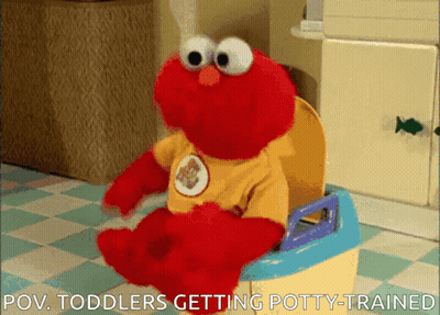 Elmo Is Sitting On A Potty With The Caption " Toddlers Getting Potty-Trained " GIF