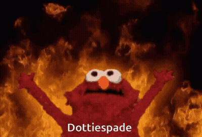 Elmo Is Standing In Front Of A Fire And Says ' Dottiespade ' At The Bottom GIF